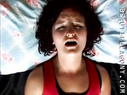 Curly hair pretty girlfriend using vibrator to reach a beautiful orgasm